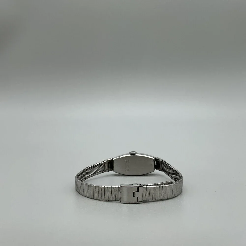 Vintage Timex Womens Watch 14mm Oval Dial Silver Tone Adj Band Manual Wind